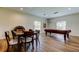 Entertainment game room features a pool table, table with chairs, and plenty of space for leisure and relaxation at 10601 42Nd N Ct, Clearwater, FL 33762