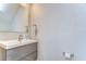 Stylish half bathroom features a sleek vanity with modern fixtures and neutral tones at 11309 Grand Park Ave, Riverview, FL 33578