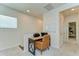 Functional office space with a modern desk and natural light at 11309 Grand Park Ave, Riverview, FL 33578