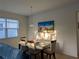 Cozy dining area with a modern table and chairs, perfect for Gathering meals at 11527 Southern Creek Dr, Gibsonton, FL 33534