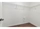 This is a walk-in closet with carpet, wire shelving, and white walls at 12310 Streambed Dr, Riverview, FL 33579