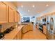 Open kitchen featuring stainless steel appliances and modern cabinetry at 12920 Lake Ventana Dr, Tampa, FL 33625