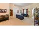 Open living room with neutral walls and ample space for seating at 12920 Lake Ventana Dr, Tampa, FL 33625