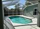 This private pool area features crystal-clear waters, creating the perfect outdoor oasis for relaxation at 12920 Lake Ventana Dr, Tampa, FL 33625