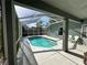 A beautiful screened-in pool area perfect for enjoying the outdoors with easy access from inside the home at 12920 Lake Ventana Dr, Tampa, FL 33625