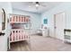 Well-lit bedroom with a bunk bed and a dedicated study area, perfect for a room at 13008 Eagles Entry Dr, Odessa, FL 33556