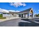 Eagles Golf Club features a stylish clubhouse with stone accents and covered entrance at 13008 Eagles Entry Dr, Odessa, FL 33556