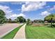 Welcome to The Eagles, a gated community with lush landscaping and a beautiful entrance at 13008 Eagles Entry Dr, Odessa, FL 33556
