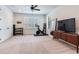 Spacious home gym featuring modern exercise equipment and plenty of natural light at 13008 Eagles Entry Dr, Odessa, FL 33556