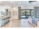 Open-concept living area with seamless access to the outdoor patio and pool at 13008 Eagles Entry Dr, Odessa, FL 33556