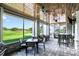 Relax on the outdoor patio with golf course views, providing a perfect blend of comfort and scenery at 13008 Eagles Entry Dr, Odessa, FL 33556