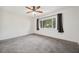Sunlit bedroom with a large window and closet space at 1308 W Perdiz St, Tampa, FL 33612