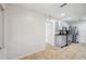 Kitchen featuring stainless appliances, granite countertops and gray cabinets at 1308 W Perdiz St, Tampa, FL 33612