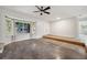Spacious living room with bay window and polished concrete flooring at 1308 W Perdiz St, Tampa, FL 33612