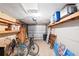 Spacious garage providing secure parking and ample storage for vehicles and recreational equipment at 1424 Castleworks Ln, Tarpon Springs, FL 34689