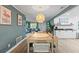 Dining area with adjacent living room and kitchen, perfect for entertaining guests at 1596 Idle Dr, Clearwater, FL 33756