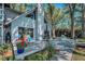 Charming backyard deck with seating, landscaping, and lake views at 16019 Chastain Rd, Odessa, FL 33556