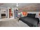Bright bedroom with wood-paneled ceiling, and large window with views at 16019 Chastain Rd, Odessa, FL 33556
