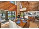 Inviting dining room features a lake view and seamless access to the living room at 16019 Chastain Rd, Odessa, FL 33556