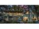 Stunning home featuring an A-frame design, balcony, and lush landscaping at 16019 Chastain Rd, Odessa, FL 33556