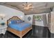 Relaxing main bedroom with wood ceiling, fan, and a window with natural light at 16019 Chastain Rd, Odessa, FL 33556
