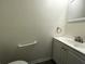 Powder room with a pedestal sink and a grab bar at 1610 58Th S Ave # 6, St Petersburg, FL 33712
