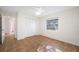 Bedroom with tiled floors, closet, ceiling fan, and a window providing natural light at 2217 Stacy Ct, Dunedin, FL 34698