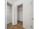 Two separate closets with tile floors and adjustable wire shelving provide ample storage space at 2217 Stacy Ct, Dunedin, FL 34698