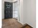 The entryway features a decorative door and tile flooring, creating a welcoming space at 2217 Stacy Ct, Dunedin, FL 34698