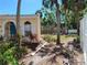 View of the lush backyard showing the property line and privacy fence at 2512 W Texas Ave # C, Tampa, FL 33629