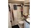 Well-lit bathroom featuring a vanity and a shower-tub combo with a patterned curtain at 2512 W Texas Ave # C, Tampa, FL 33629
