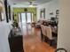 Spacious living room with hardwood floors, a ceiling fan, and glass doors to the outside at 2512 W Texas Ave # C, Tampa, FL 33629