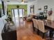 Bright living room featuring hardwood floors, neutral paint, and modern furniture perfect for relaxing and entertaining at 2512 W Texas Ave # C, Tampa, FL 33629