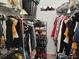 Walk-in closet with ample hanging space and shelving for storage and organization at 2512 W Texas Ave # C, Tampa, FL 33629