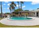 Beautiful waterfront pool with a spacious patio perfect for entertaining or relaxing by the water at 3945 Versailles Dr, Tampa, FL 33634