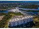 This aerial view highlights a waterfront condo with beautiful views and outdoor space at 4516 Seagull Dr # 615, New Port Richey, FL 34652