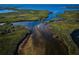 Breathtaking aerial view showcasing lush green islands surrounded by serene, expansive waters at 4516 Seagull Dr # 615, New Port Richey, FL 34652