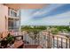 Balcony view showcasing a chair, plants, parking lot, and the surrounding area at 4516 Seagull Dr # 615, New Port Richey, FL 34652