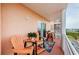 Cozy balcony featuring comfortable seating and a view of the surrounding area at 4516 Seagull Dr # 615, New Port Richey, FL 34652