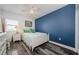 The secondary bedroom offers wood floors, a white ceiling fan, and ample natural light at 4516 Seagull Dr # 615, New Port Richey, FL 34652
