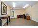 This business center features a desk, rolling chair, computer, printer, and an exit door to the hallway at 4516 Seagull Dr # 615, New Port Richey, FL 34652