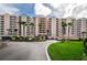 Stunning exterior of the building with well-manicured landscaping and ample parking at 4516 Seagull Dr # 615, New Port Richey, FL 34652