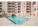 Outdoor swimming pool and jacuzzi tub offer residents a relaxing and refreshing experience at 4516 Seagull Dr # 615, New Port Richey, FL 34652