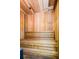 This sauna features vertical wood planks and a wooden bench for relaxing at 4516 Seagull Dr # 615, New Port Richey, FL 34652