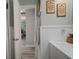 Well-lit bathroom featuring modern vanity with a decorative towel rack at 5115 32Nd N Ave, St Petersburg, FL 33710