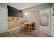 Cozy dining area with chalkboard wall and adjacent sitting area at 5115 32Nd N Ave, St Petersburg, FL 33710