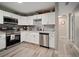 Charming kitchen with stainless appliances, ample cabinet space, and gray backsplash at 5115 32Nd N Ave, St Petersburg, FL 33710