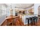 Kitchen featuring granite countertops, stainless steel appliances and an eat-in breakfast bar at 5403 Avenal Dr, Lutz, FL 33558