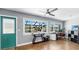 Bright home office with wood floors, lake views, and ample workspace at 613 Fort Duquesna Dr, Sun City Center, FL 33573