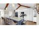 Spacious kitchen featuring a large center island, white cabinetry, and modern appliances at 613 Fort Duquesna Dr, Sun City Center, FL 33573